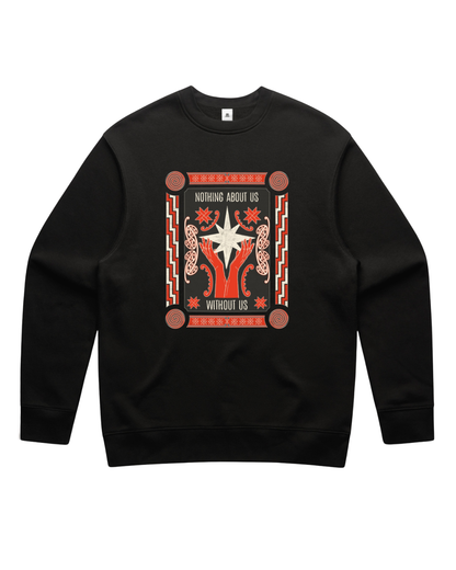 A black sweatshirt with a bold design reading "Nothing About Us Without Us" on a white background. The graphic features red hands, stars, koru and spirals.