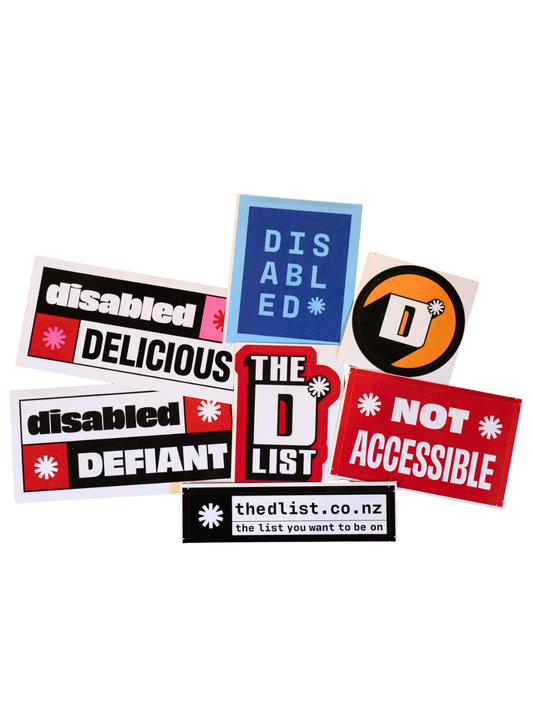 A collage of colourful stickers with bold text on a blank background. These include "The D*List" logo, "DISABLED," "disabled DELICIOUS," "disabled DEFIANT," "NOT ACCESSIBLE," and a web address.