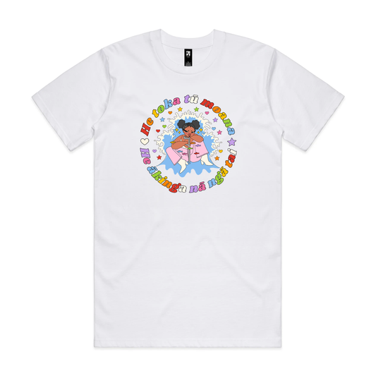 A white T-shirt with a person with a moko kauae and a crutch amid a splash and stars, surrounded by colourful text reading “He toka tū moana, he ākinga nā ngā tai.”